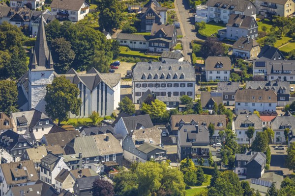 Aerial view, view of the town with St. Clemens-Kirche und Altes Kloster Drolshagen, Drolshagen, Sauerland, North Rhine-Westphalia, Germany, place of worship, DE, Europe, religious community, place of worship, property tax, holy place, real estate, church, parish, monastery, denomination, aerial view, aerial photography, aerial photography, religion, religious site, Ruhr area, overview, bird's eye view, residential area, living and life, residential area, quality of life, residential neighbourhood, housing estate, residential area, birds-eyes view, overview