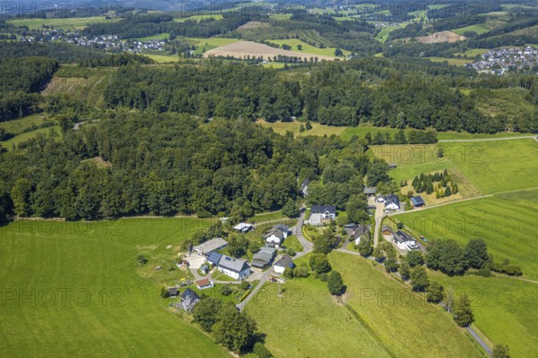 Aerial view, housing estate Dirkingen at the edge of the forest with hilly landscape, Iseringhausen, Drolshagen, Sauerland, North Rhine-Westphalia, Germany, DE, Europe, property tax, real estate, aerial view, aerial photography, aerial photography, Ruhr area, overview, bird's-eye view, housing estate, housing and living, residential area, residential quality, residential neighbourhood, housing estate, residential district, birds-eyes view, overview