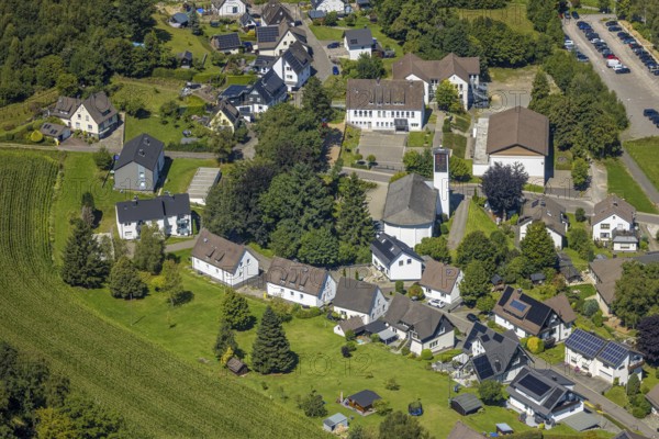 Aerial view, Church of the Nativity of Mary and primary school, residential area, local view, district of Hützemert, Drolshagen, Sauerland, North Rhine-Westphalia, Germany, place of worship, education, educational institution, DE, Europe, religious community, place of worship, holy place, church, parish, denomination, educational institute, aerial view, aerial photography, aerial photography, religion, religious site, Ruhr area, school, overview, bird's-eye view, overview