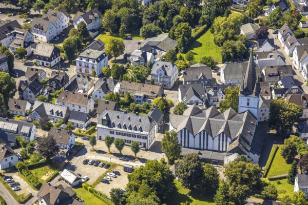 Aerial view, view of the town with St. Clemens-Kirche und Altes Kloster Drolshagen, Drolshagen, Sauerland, North Rhine-Westphalia, Germany, place of worship, DE, Europe, religious community, place of worship, property tax, holy place, real estate, church, parish, monastery, denomination, aerial view, aerial photography, aerial photography, religion, religious site, Ruhr area, overview, bird's eye view, residential area, living and life, residential area, quality of life, residential neighbourhood, housing estate, residential area, birds-eyes view, overview