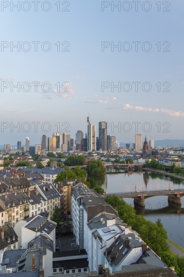 Frankfurt City Downtown, Residential Buildings, Bridges and Main River at Sunrise. Wide Shot. Aerial View. Hesse, Germany