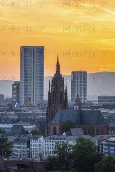 Frankfurt Cathedral, Residential Buildings and City at Fiery Sunset. Gothic Church. Aerial View. Golden Hour. Hesse, Germany