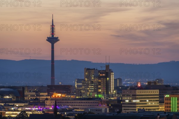 FRANKFURT, GERMANY - JUNE 12, 2025: Europaturm Telecommunications Tower in Frankfurt City at Evening Twilight. Blue Hour. Hesse, Germany