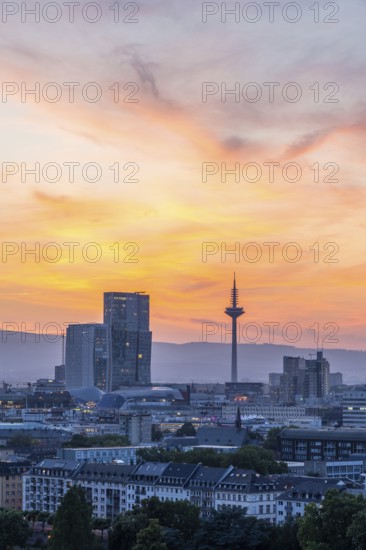 FRANKFURT, GERMANY, JUNE 12, 2025: Europaturm Telecommunications Tower in Frankfurt City at Fiery Sunset. Hesse, Germany