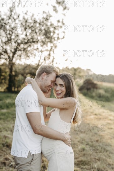 Pregnant, young woman with partner
