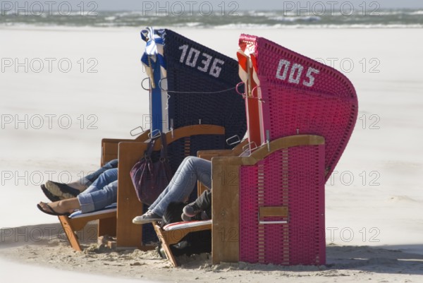 Pure enjoyment of the last rays of sunshine of the year on the beach of Norddorf on the North Frisian island of Amrum, Amrum, Norddorf, North Frisia, Germany