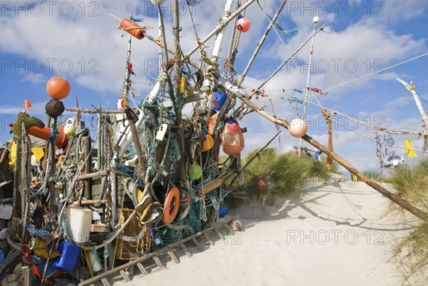 Works of art made from rubbish washed up from the sea in the dune landscape of the North Frisian island of Amrum, Amrum, Süddorf, North Frisia, Germany