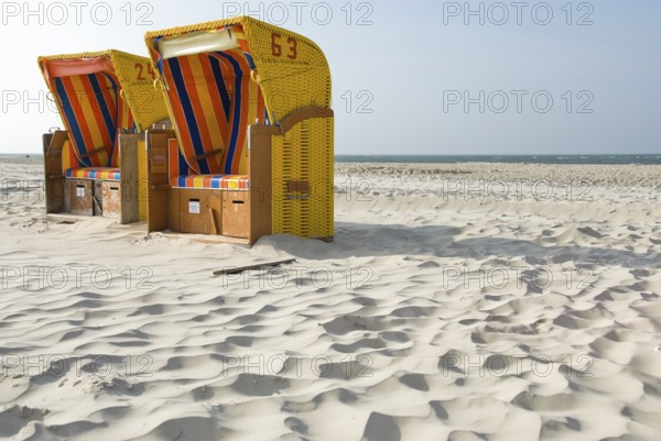 Pure enjoyment of the last rays of sunshine of the year on the beach of Norddorf on the North Frisian island of Amrum, Amrum, Norddorf, North Frisia, Germany