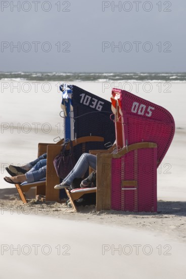 Pure enjoyment of the last rays of sunshine of the year on the beach of Norddorf on the North Frisian island of Amrum, Amrum, Norddorf, North Frisia, Germany