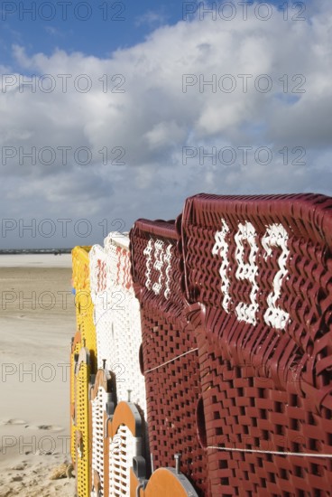 The beach chairs in the village of Norddorf on the North Frisian island of Amrum go into hibernation, Amrum, Norddorf, Nordfriesland, Germany
