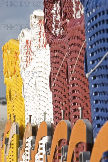 The beach chairs in the village of Norddorf on the North Frisian island of Amrum go into hibernation, Amrum, Norddorf, Nordfriesland, Germany