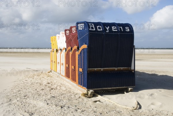 The beach chairs in the village of Norddorf on the North Frisian island of Amrum go into hibernation, Amrum, Norddorf, Nordfriesland, Germany