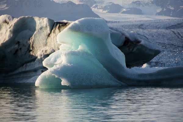 Calved icebergs, glacial lake, Jökularson, Iceland