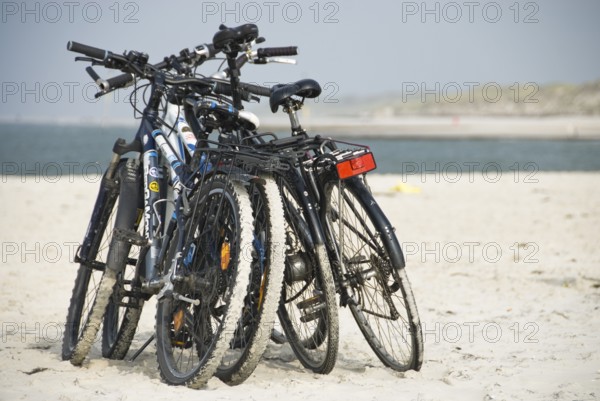 Bicycle still life on the beach of Norddorf on the North Frisian island of Amrum, Amrum, Norddorf, North Frisia, Germany