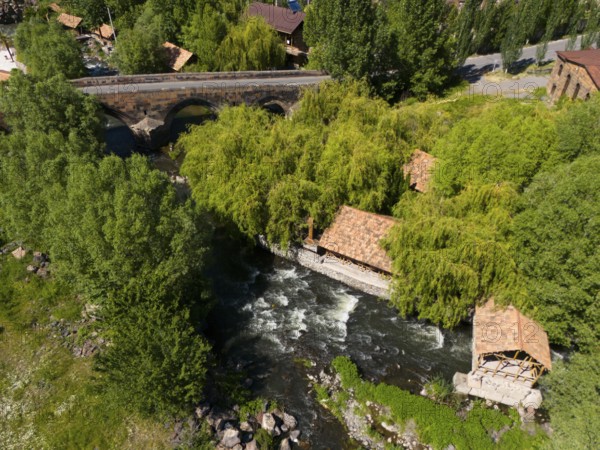 Aerial view of a river surrounded by lush trees and a small bridge, aerial view, bridge from 1705 over the Kassagh, Oskahan, Oshakan, Ošakan, Aragazotn Province, Armenia