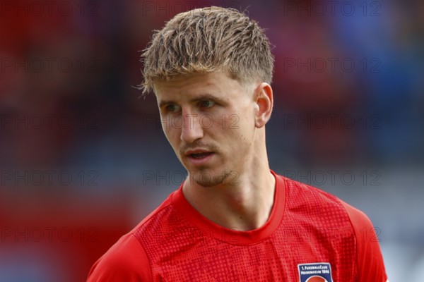 Football, Bundesliga 1, Matchday 1, 2025/2026, 1. FC Heidenheim vs. VFL Wolfsburg, 23/08/2025, Voith-Arena, Heidenheim, Germany, Jan SCHÖPPNER 1. FC Heidenheim 3