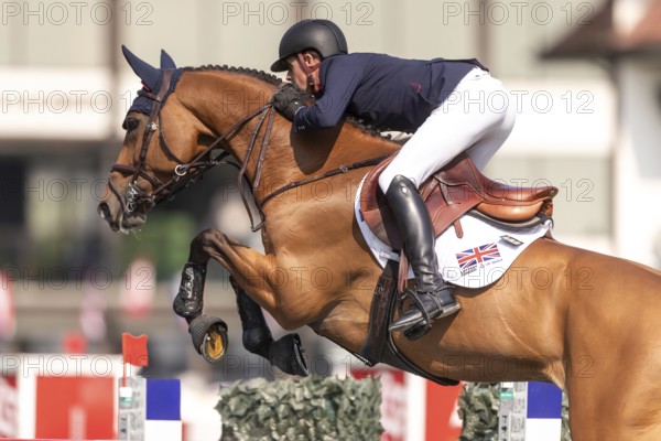 Ben Maher of England, riding Enjeu De Grisien, competes in the first round of the 2025 BMO Nations Cup during the Spruce Meadows Masters on September 6, 2025 in Calgary, Alberta, Canada, North America