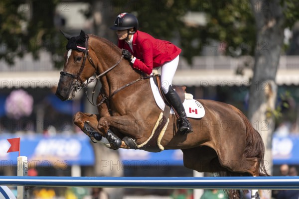 Tiffany Foster of Canada, riding Electrique, competes in the first round of the 2025 BMO Nations Cup during the Spruce Meadows Masters on September 6, 2025 in Calgary, Alberta, Canada, North America