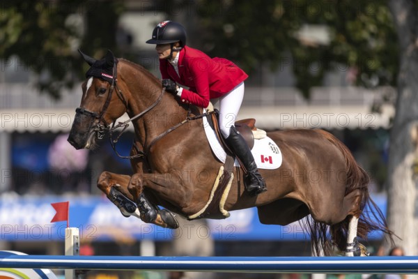 Tiffany Foster of Canada, riding Electrique, competes in the first round of the 2025 BMO Nations Cup during the Spruce Meadows Masters on September 6, 2025 in Calgary, Alberta, Canada, North America