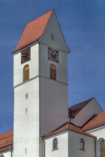 Church tower with gabled roof and clock, parish church of St Lawrence from 1404 in Leupolz in Karbachtal, Allgäu, Baden-Württemberg, Germany