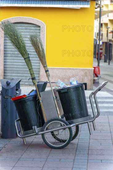 Street cleaning equipment stands ready for use, promoting hygiene and urban cleanliness in ronda, malaga, spain