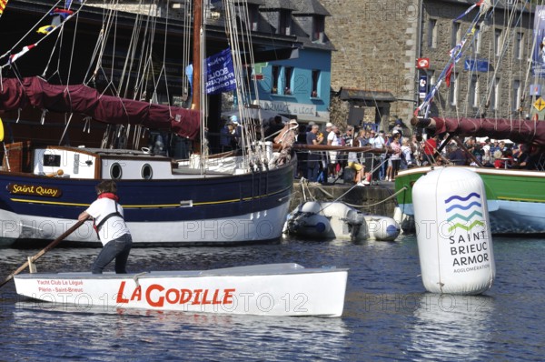Sculling demonstration at the Solitaire du Figaro in Plérin in Brittany, France redactional use only
