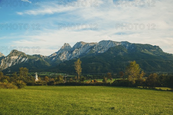 Landscape with green meadow and trees, Admonter Reichenstein group in the background, Weng im Gesäuse, Styria, Austria
