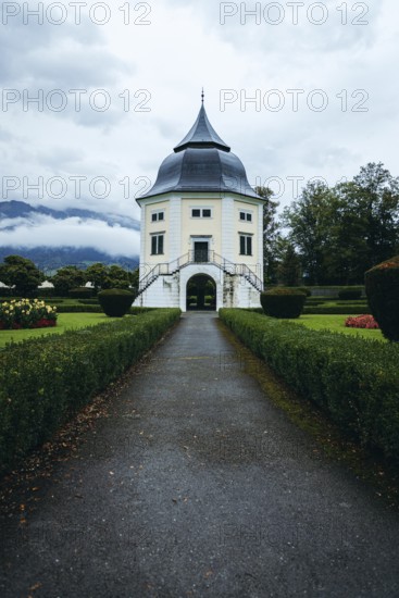 Baroque pavilion in the park of Admont Abbey under a cloudy sky, Admont, Styria, Austria