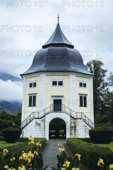 Baroque pavilion in the park of Admont Abbey under a cloudy sky, Admont, Styria, Austria