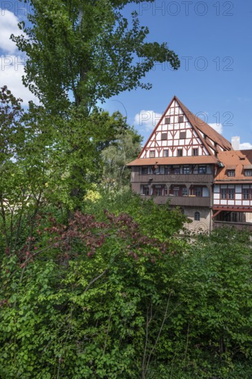 Former wine barn on the Pegnitz, built between 1446 and 1448, now a student residence, Nuremberg, Middle Franconia, Bavaria, Germany