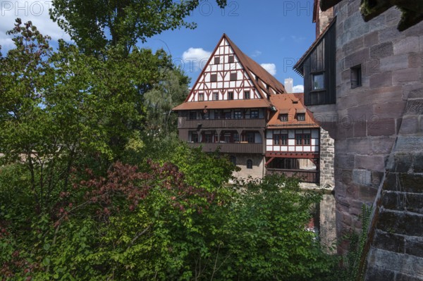 Former wine barn on the Pegnitz, built between 1446 and 1448, now a student residence, Nuremberg, Middle Franconia, Bavaria, Germany