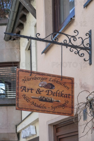 Nose sign at a shop for gingerbread and baking accessories, Trödelmarkt 45, Nuremberg, Central Franconia, Bavaria, Germany