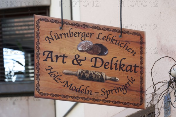 Nose sign at a shop for gingerbread and baking accessories, Trödelmarkt 45, Nuremberg, Central Franconia, Bavaria, Germany