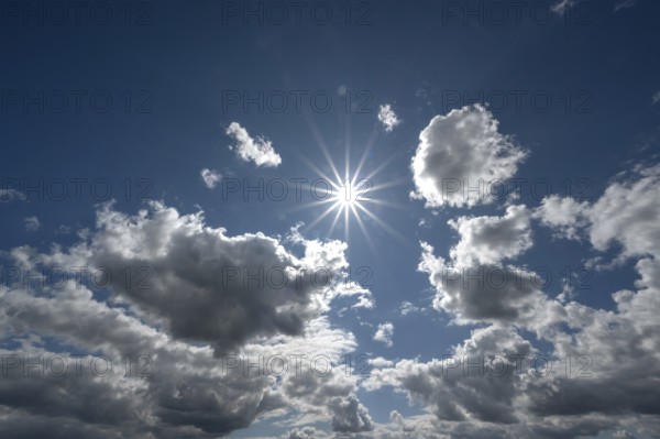 Clouds and sun star, Bavaria, Germany