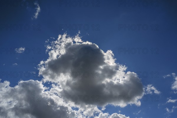 Sun behind a rain cloud (Nimbostratus), Bavaria, Germany