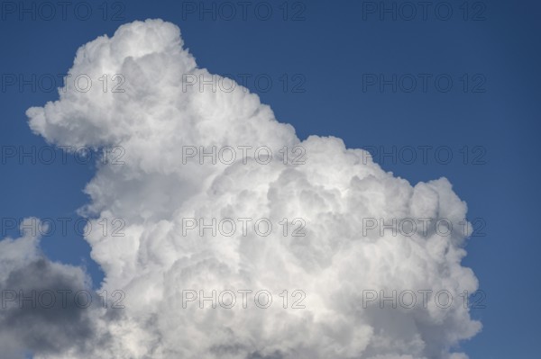 Cluster clouds (cumulus), rain clouds on the left Bavaria, Germany