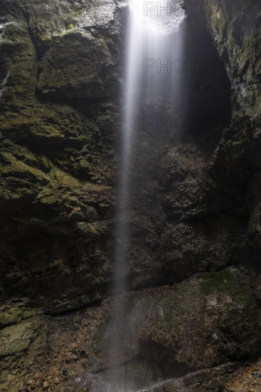 Water gushing into the gorge, small waterfall, Schrattenkalk, Breitachklamm, Oberstdorf, Allgäu Alps, Bavaria, Germany