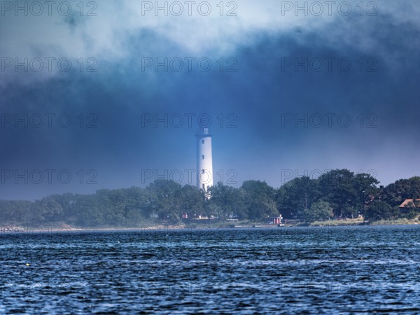 Long Erik lighthouse, Long Erik, on the northern tip of the Swedish island of Stora grundet in the Baltic Sea, in fog, Stora grundet, Öland, Sweden