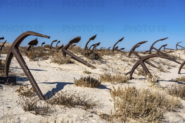 Cemitério das âncoras, anchor cemetery, around 250 iron anchors are placed here, they used to anchor a network of nets on the seabed to catch shoals of tuna travelling along the coast, a reminder of the Algarve's defunct tuna fishery, on Praia do Barril beach on the island of Tavira, Praia da Ilha de Tavira, Algarve, Portugal
