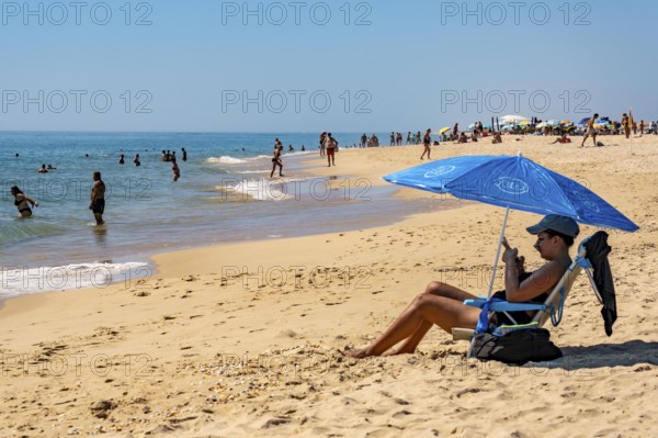Kilometre-long beach Praia da Ilha de Tavira, on the island off Tavira, partly managed, Algarve, Portugal