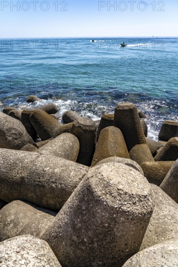 Coastal fortification at the beacon to the harbour entrance on the kilometre-long beach Praia da Ilha de Tavira, on the island off Tavira, Portugal