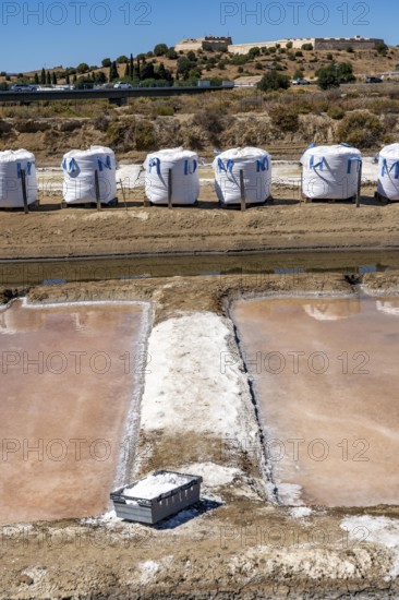 Salt production on the Algarve coast in Portugal, 95 per cent of Portuguese sea salt is extracted here, salt pans near Vila Real de Santo António, Flor de Sal production