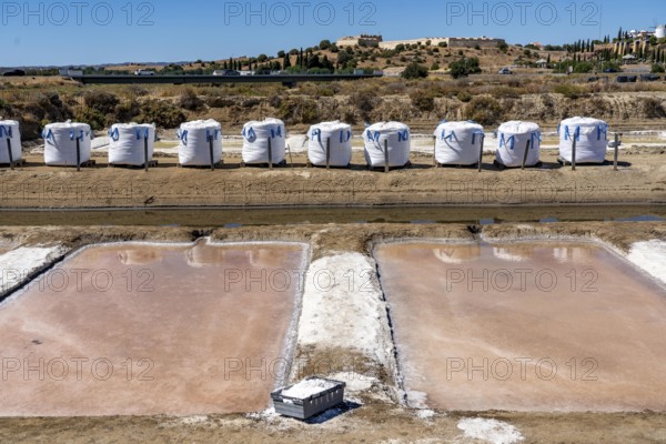 Salt production on the Algarve coast in Portugal, 95 per cent of Portuguese sea salt is extracted here, salt pans near Vila Real de Santo António, Flor de Sal production