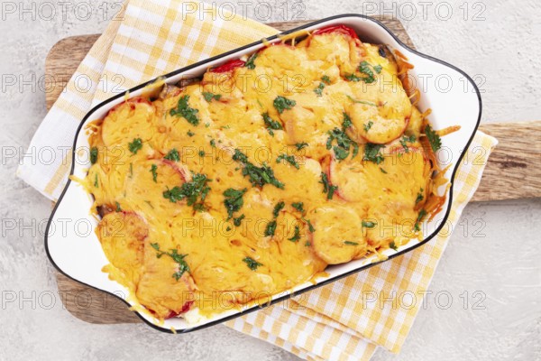 Madame Bovary's Georgian dish, chicken fillet with mushrooms, tomatoes and cheese, baked in a mold