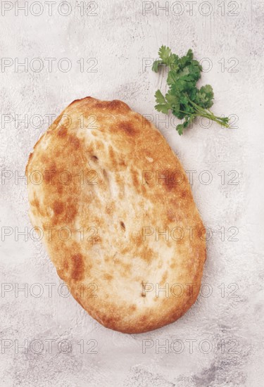 Georgian lavash bread, freshly baked, top view, on the table, no people