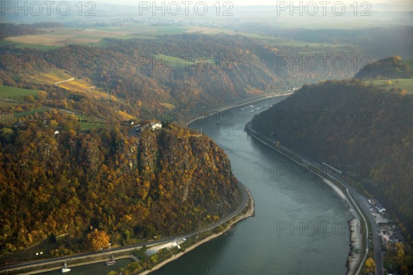The Loreley, Lorelei, slate cliffs in the UNESCO World Heritage Upper Middle Rhine Valley near Sankt Goarshausen, Rhine Valley, Rhine, inland navigation, Rhine meanders, shallows, autumn leaves, Sankt Goar, Rhineland-Palatinate, Germany, Europe, aerial view, birds-eyes view, aerial photography, aerial photography, overview, bird's eye view