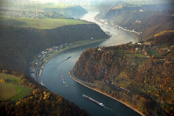 The Loreley, Lorelei, slate cliffs in the UNESCO World Heritage Upper Middle Rhine Valley near Sankt Goarshausen, Rhine Valley, Rhine, inland navigation, Rhine meanders, shallows, autumn leaves, Sankt Goar, Rhineland-Palatinate, Germany, Oberwesel, Europe, aerial view, birds-eyes view, aerial photography, aerial photography, overview, overview, bird's eye view