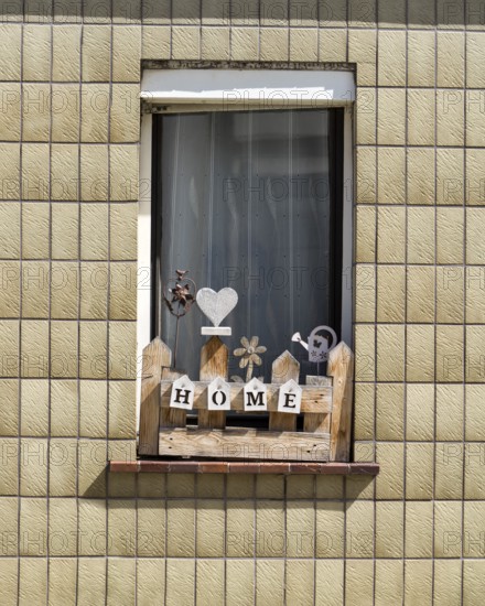 Monoton tiled house facade with decorated windows, Zierenberg, district of Kassel, Hesse, Germany