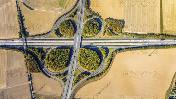 Aerial view, motorway junction Erwitte Anröchte, motorway A44, federal road B55, Anröchte, district Soest, North Rhine-Westphalia, Germany, B & W Deloitte GmbH, DE, Europe, shapes and colours, green trees, green areas, district Soest-Buch, district Soest-Buch, aerial view, aerial photography, aerial photography, road traffic, overview, traffic volume, bird's-eye view, meadows and fields, birds-eyes view, overview, motorway junction Anröchte