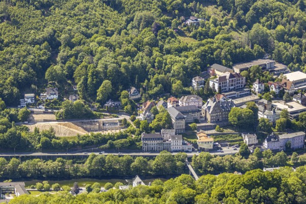 Aerial photograph, demolition Eugen-Schmalenbach-Berufskolleg, Bismarckstraße, Altena town hall, Burggymnasium Altena, Altena, Sauerland, Märkischer Kreis, North Rhine-Westphalia, Germany, authority, education, educational institution, DE, DITIB - Türkisch Islamischer Verein zu Altena e.V., Europe, river Lenne, grammar school, Altena district hall, teaching institute, aerial view, aerial photography, aerial photography, town hall, school, sports hall, town administration, overview, administrative area, bird's-eye view, forest area, birds-eyes view, overview